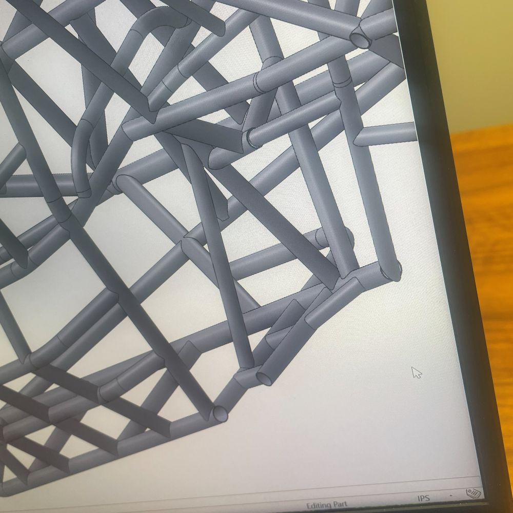 A 3D scan of a tube frame on screen