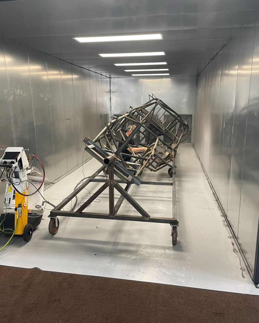 A chassis in the powder coating booth