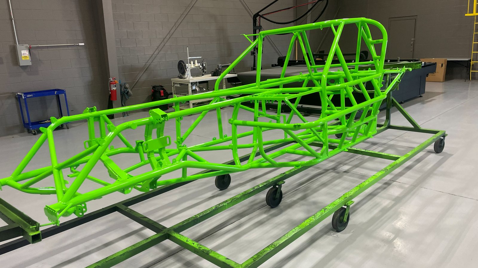 Tube chassis outside the shop, coated and ready to go out
